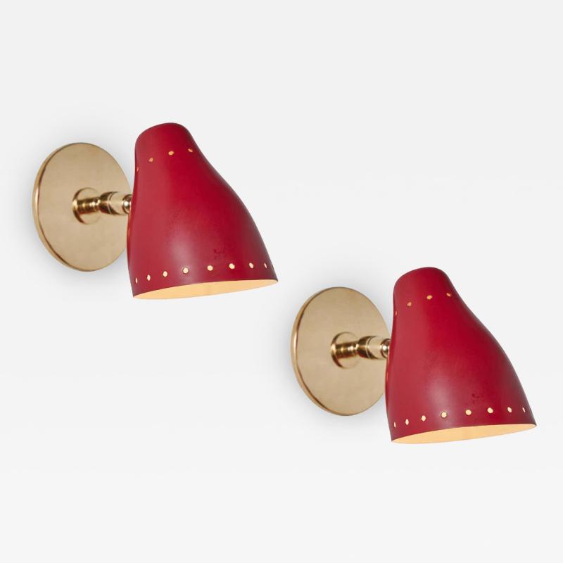 Jacques Biny Pair of 1950s Red Perforated Sconces Attributed to Jacques Biny