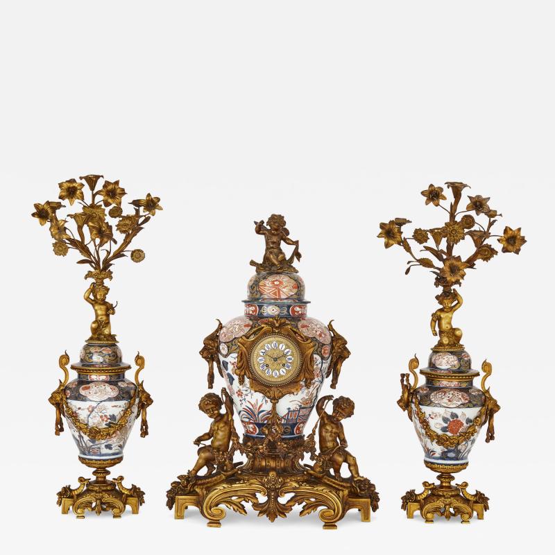 Japanese Imari porcelain and gilt bronze clock set