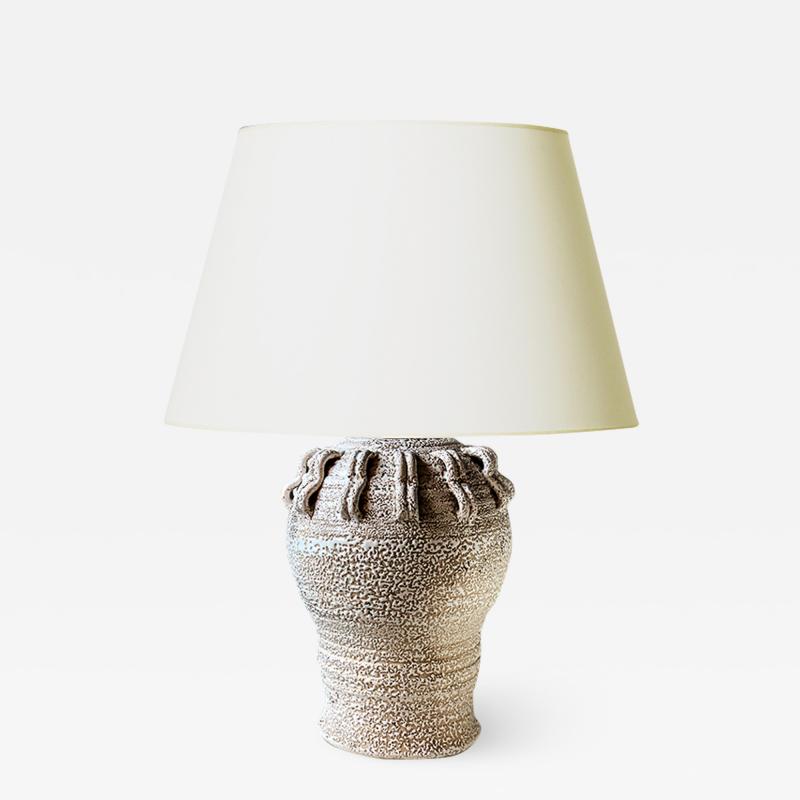 Jean Besnard Table lamp with applied looping ornament in the style of Jean Besnard