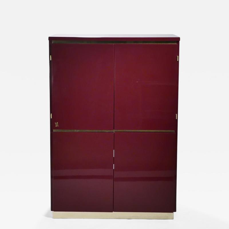 Jean Claude Mahey Red lacquer and brass cabinet by J C Mahey 1970 s