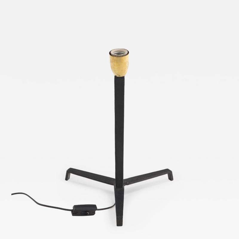 Jean Michel Frank A pair of iron tripod table lamps in the manner of Jean Michel Frank 