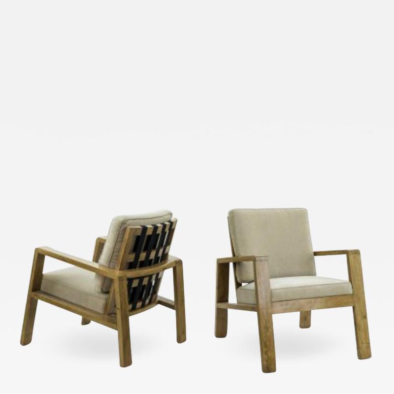 Jean Roy re Jean Royere pair of documented oak slender lounge chairs