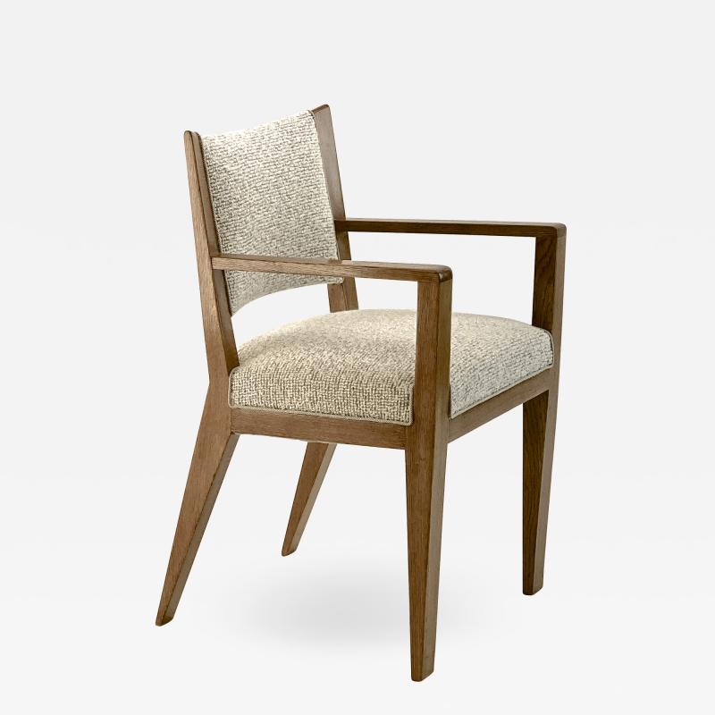 Jean Roy re Jean Royere refined oak arm chair newly covered In boucle cloth