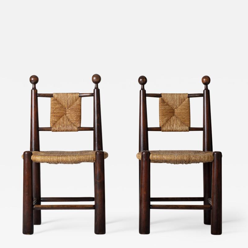 Jean Roy re Pair of Oak and Straw Chairs in the Manner of Jean Roy re