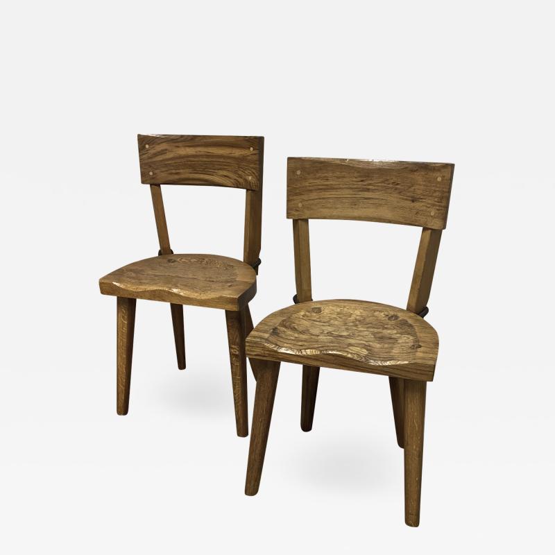 Jean Touret Jean Touret pour les Ateliers de Marolles pair of brutalist solid wood chairs