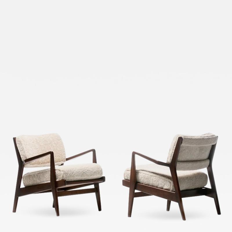 Jens Risom Jens Risom Walnut Lounge Chairs in Ivory Shearling circa 1950s