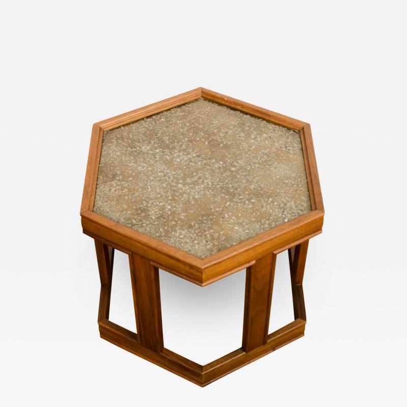 John Keal A handsome hexagonal walnut side table with gold copper pebbled resin design