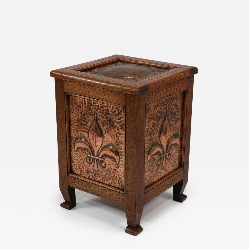 John Pearson John Pearson attri An Arts and Crafts log or coal box with Fleur De Lys details