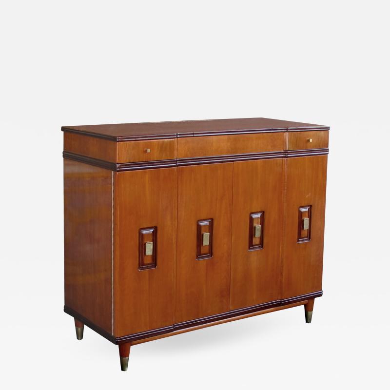 John Widdicomb A handsome and rare American walnut dressing cabinet by John Widdicomb