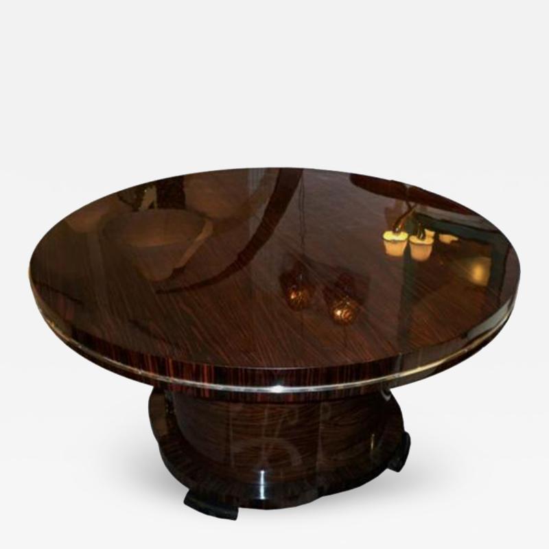 Josef DeCoene A Large Round Extending Art Deco Dining Table by Josef DeCoene