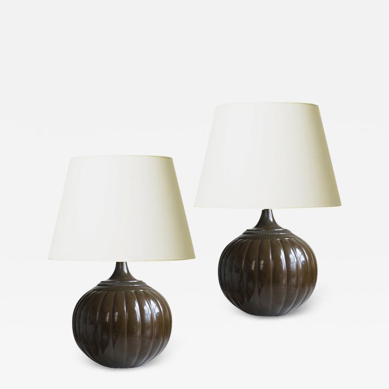 Just Andersen Pair of pumpkin form table lamps in patinated Disko by Just Andersen