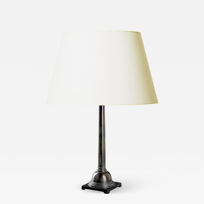 Just Andersen Rare tall column form table lamp in patinated bronze by Just Andersen