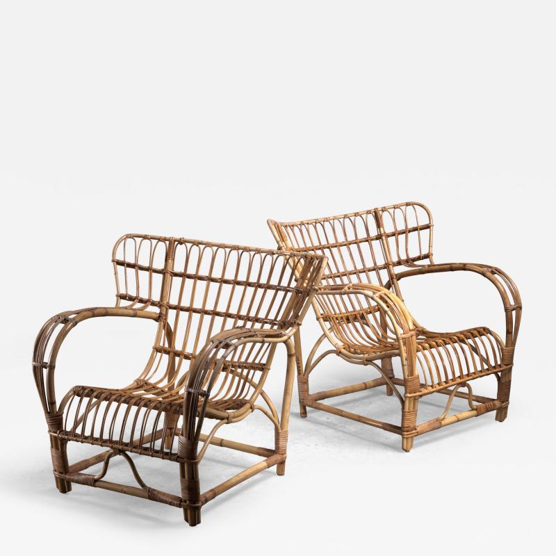 KW Larsson Pair of John Larsson rattan lounge chairs