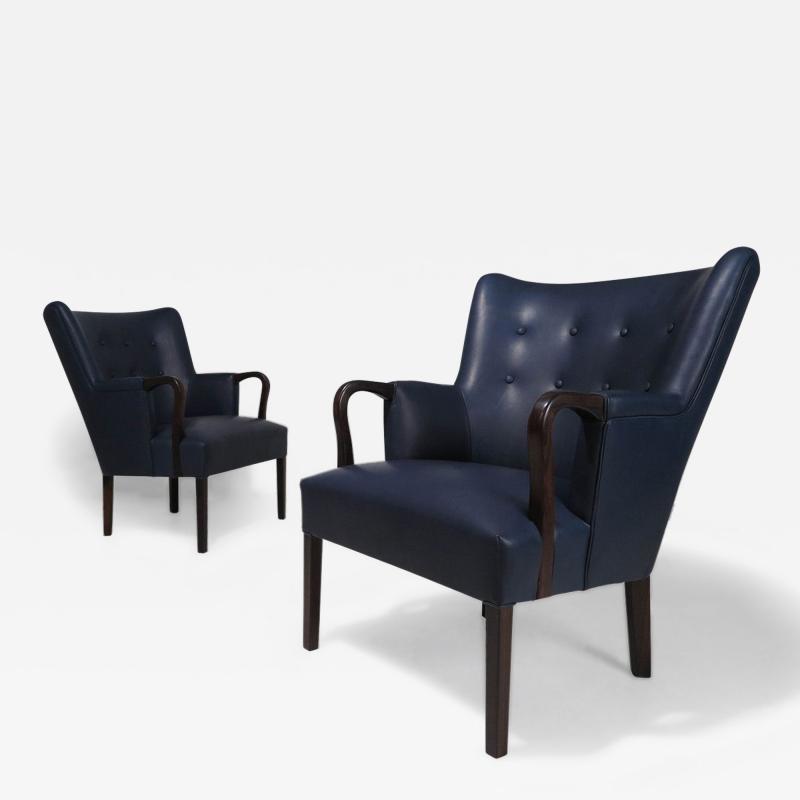 Kaare Klint An Elegant Pair of Rosewood Leather Armchairs by Kaare Klint