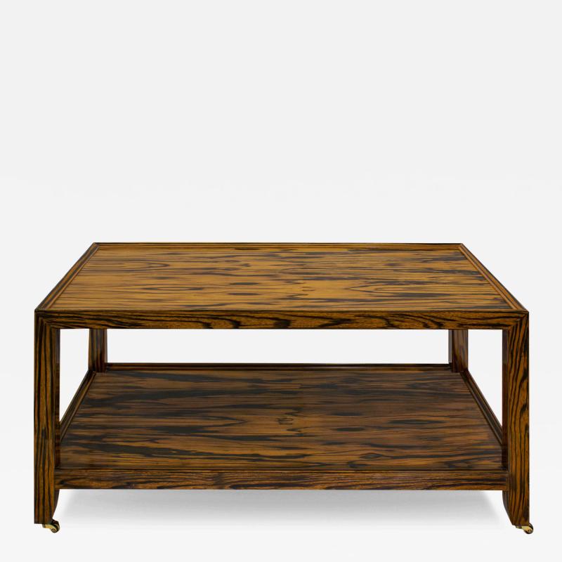 Karl Springer Karl Springer Chic Coffee Table in Zebrawood with Brass Castors 1980s