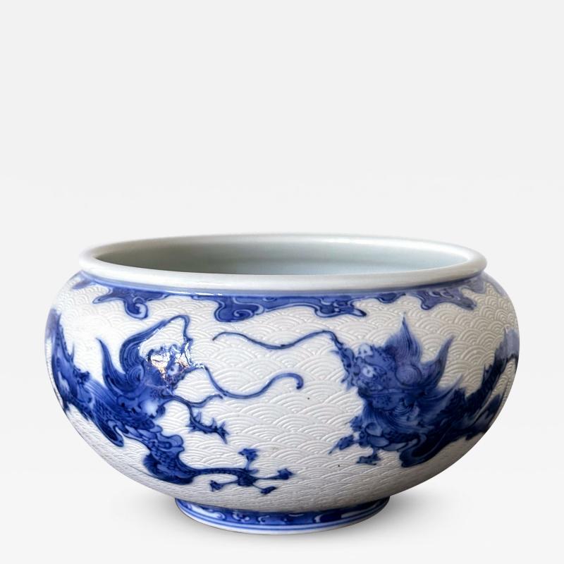 Kozan Makuzu Japanese Glazed and Caved Ceramic Dragon Bowl by Makuzu Kozan