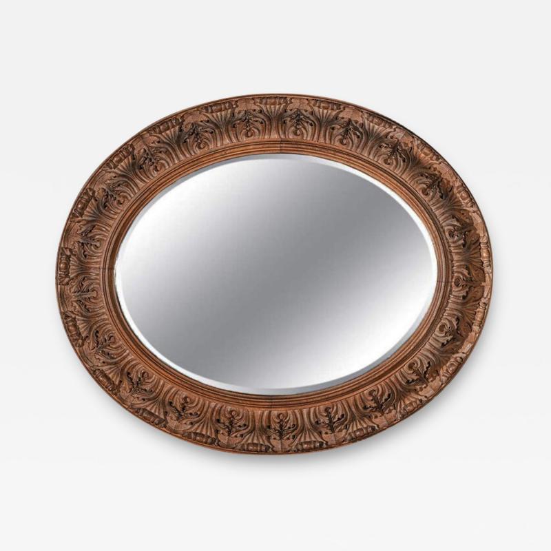 LARGE 19TH CENTURY SWEDISH OVAL CARVED OAK MIRROR BY A LUNDMARK