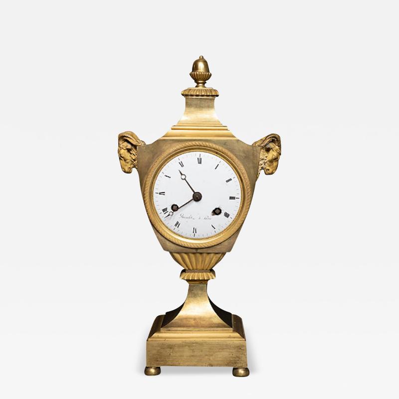 LOUIS XVI PERIOD GILT BRONZE RAMS HEAD CLOCK