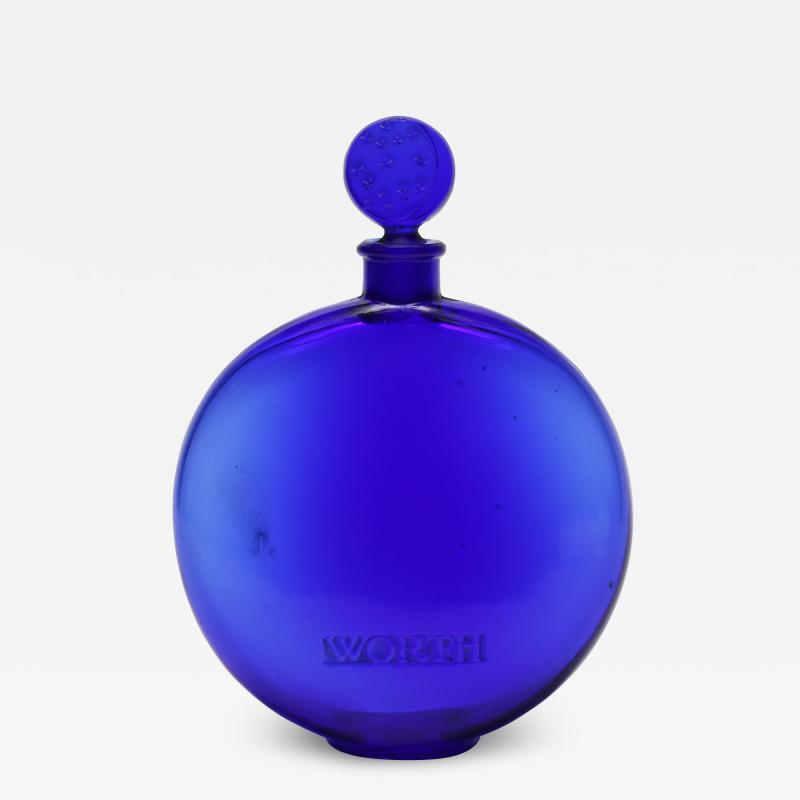 worth perfume blue bottle