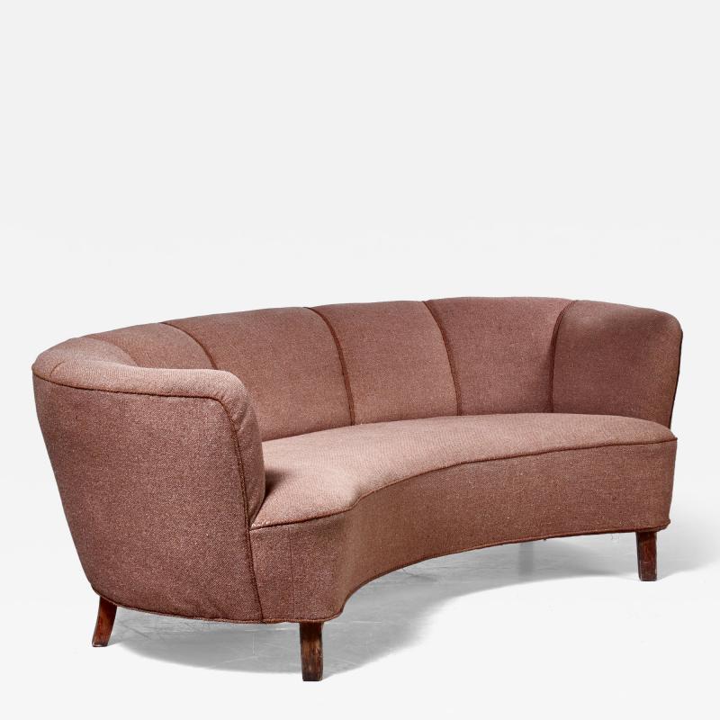 Large Danish curved sofa