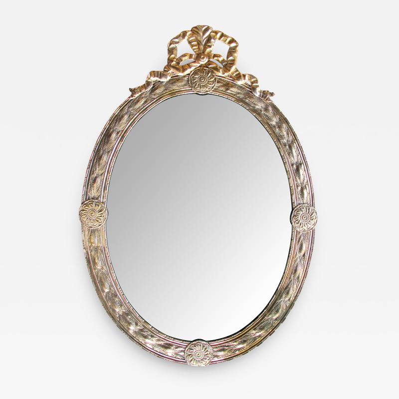 Large Dutch Neoclassical Style Silver and Gold Gilt Repouss Oval Mirror