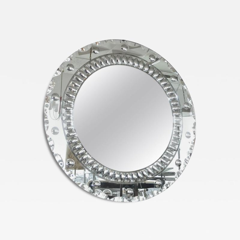 Large Italian Art Deco round mirror with highly decorative optic bullseye detail