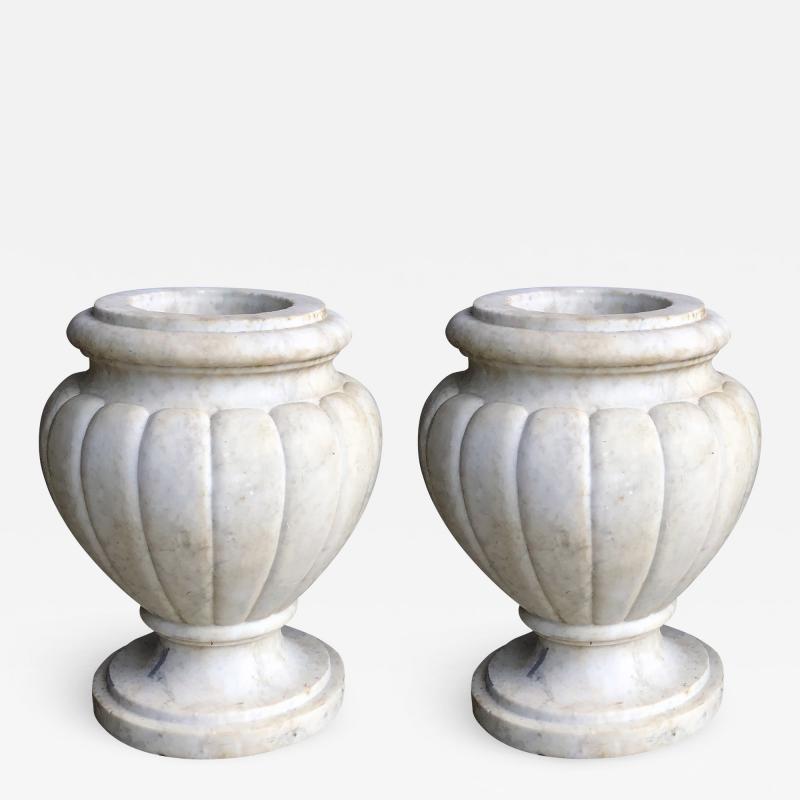 Large and Refined Pair of Italian Neoclassical Style Carved Carrera Marble Urns