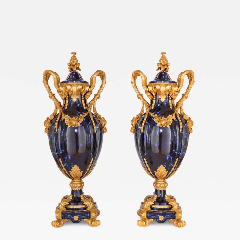 Large pair of Rococo style gilt bronze and blue ceramic vases