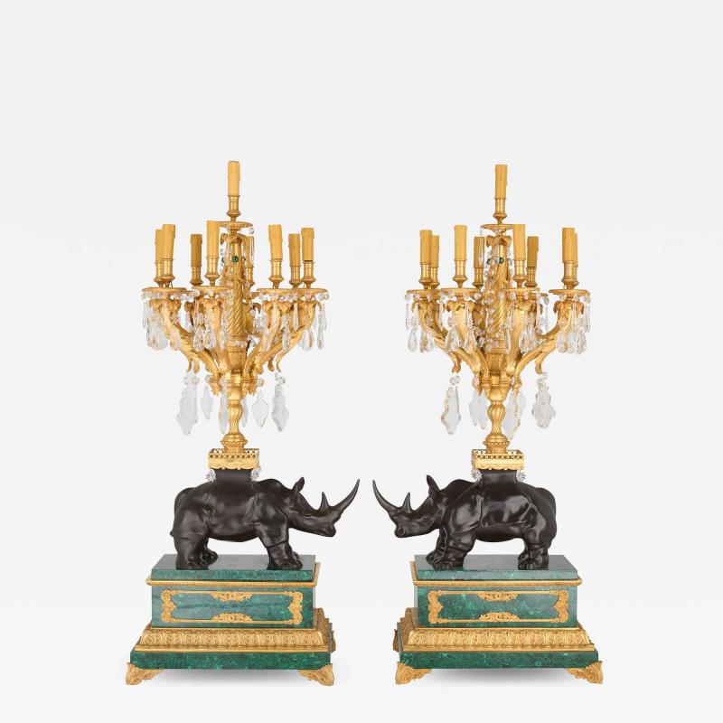 Large pair of ormolu and malachite rhino table candelabra