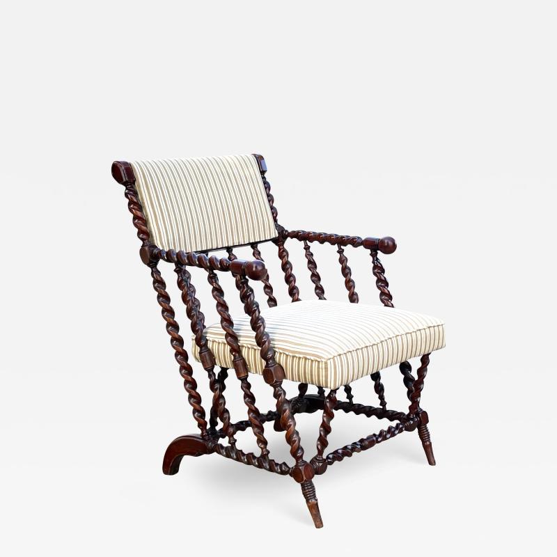 Late 19th century English barley twist carved armchair