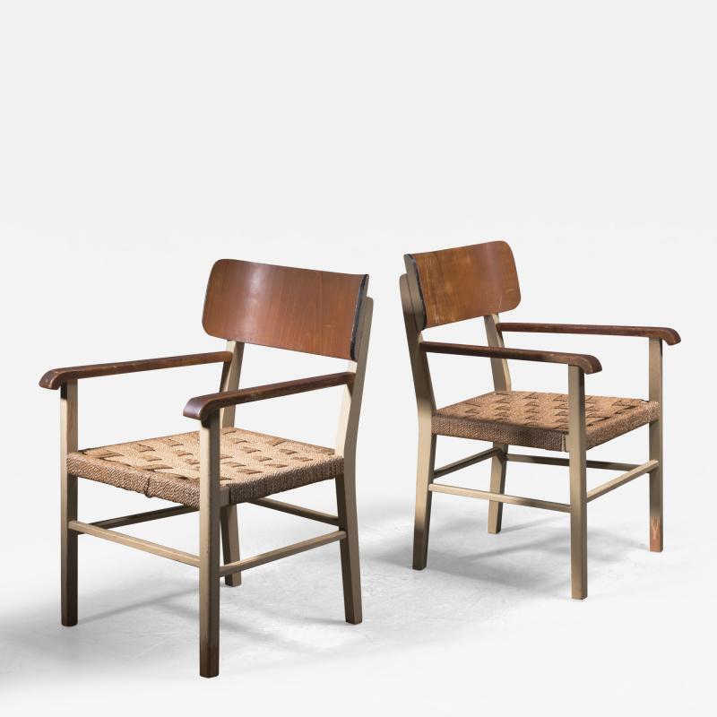Light and transparent pair of Scandinavian Modern armchairs