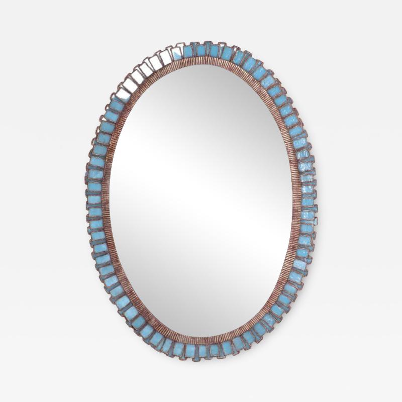 Line Vautrin An oval mirror made of gilt resin and blue glass in the manner of Line Vautrin 