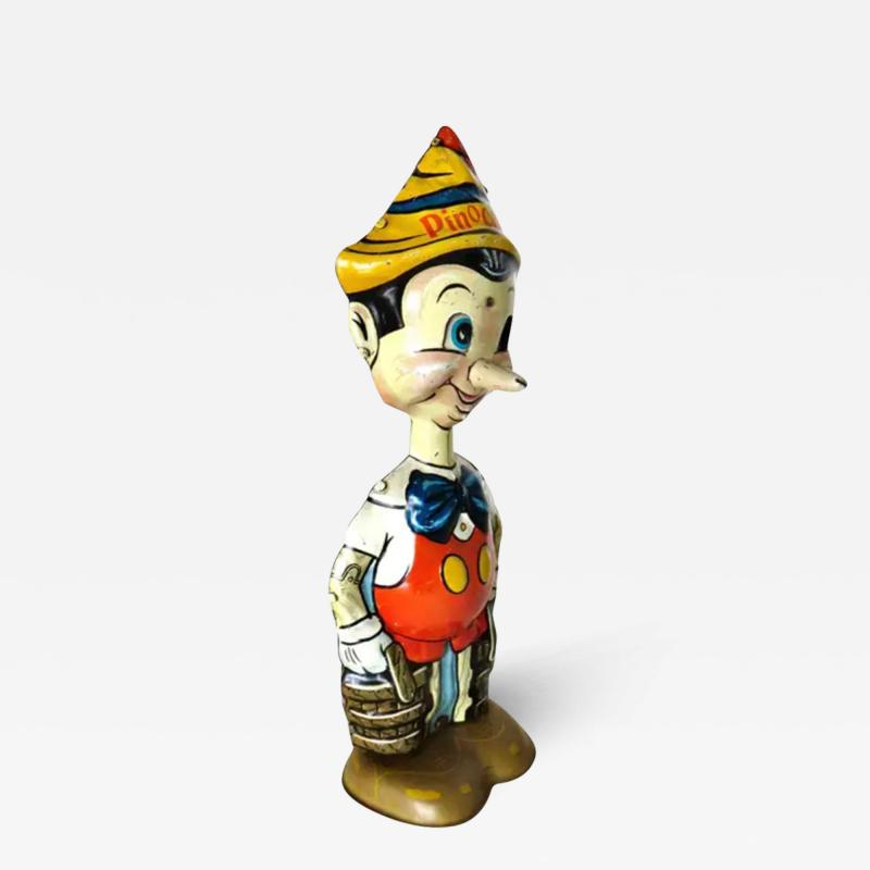 Louis Marx and Company Walt Disney Enterprises Pinocchio Wind Up Toy by Marx Toy Co N Y Dated 1939