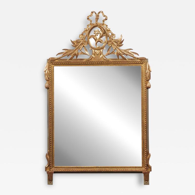 Louis XVI Style Gilt Wood Mirror with Floral Carved Medallion Crest and Tassels