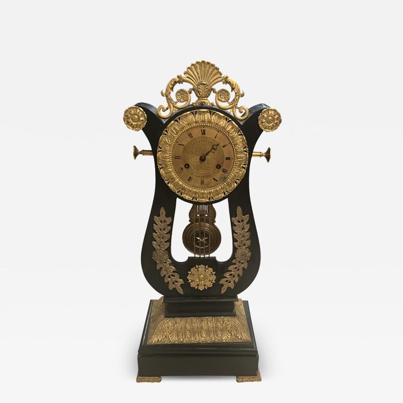 MARTIN PIGNERET FRENCH EMPIRE LYRE CLOCK EBONIZED WOOD AND GILT BRONZE WITH STAR PENDULUM