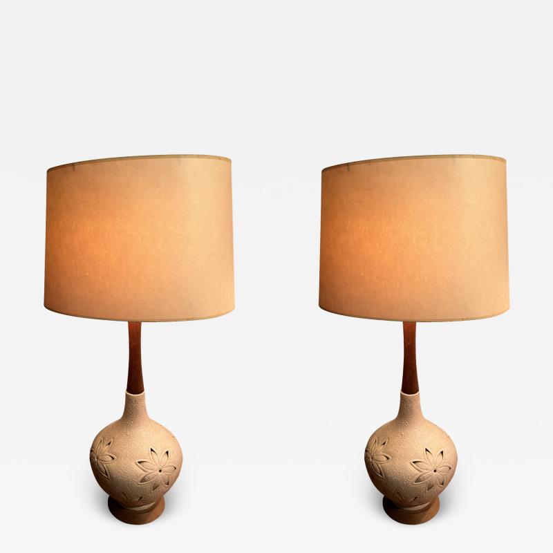 MID CENTURY FLOWER INCISED CERAMIC AND WOOD LAMPS WITH INTERNAL LIGHT