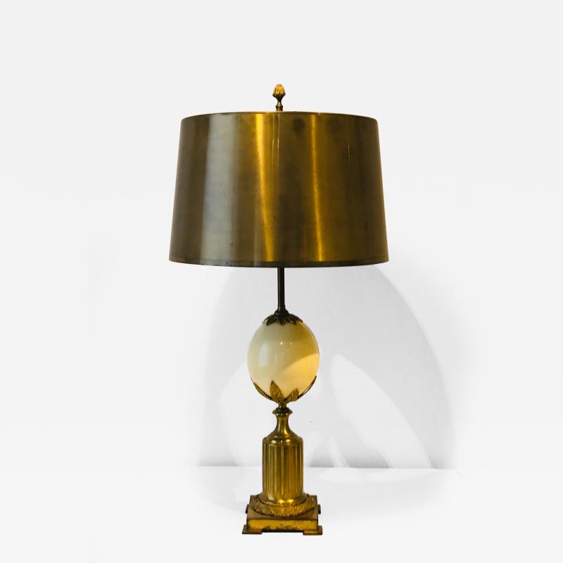 Maison Charles A gilded bronze table lamp by Maison Charles