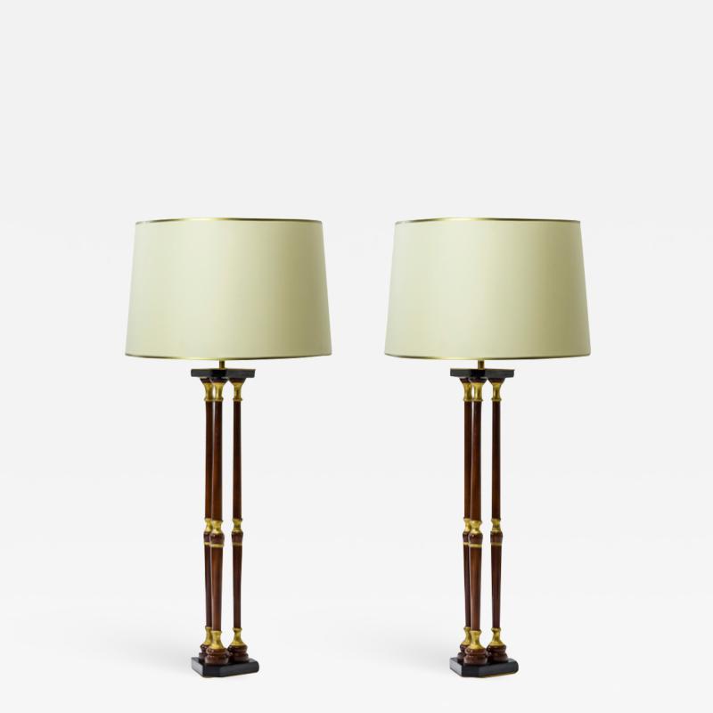 Maison Jansen Maison Jansen lacquered wood and gold leaf adorn pair of lamps