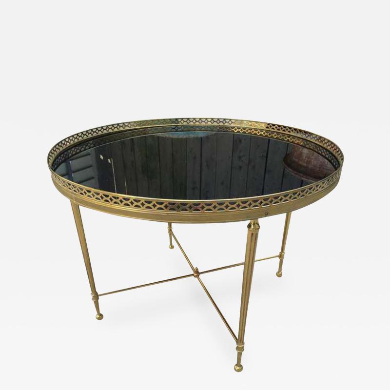 Maison Jansen ROUND COFFEE TABLE WITH BLACK OPALINE GLASS AND GALLERY TOP