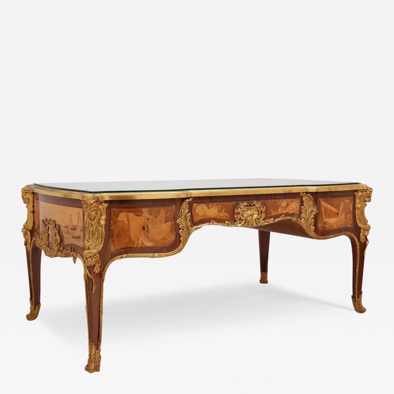 Maison L ger Antique French Louis XV style ormolu mounted marquetry desk by Maison L ger