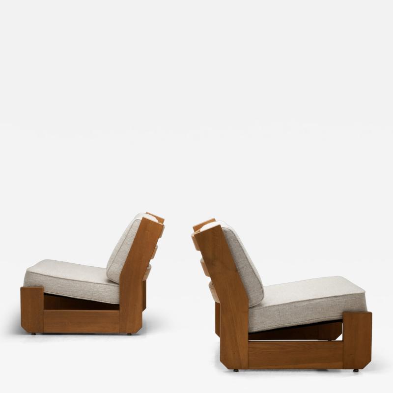 Maison Regain Pair of Maison Regain Lounge Chairs France Second half of the 20th Century