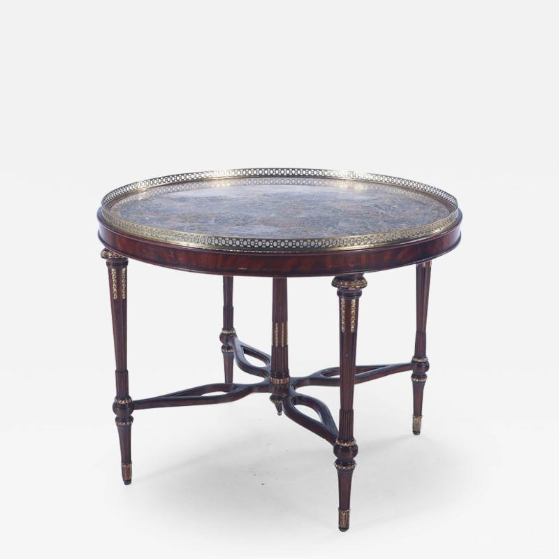 Maitland Smith A Maitland Smith crotch mahogany center table having a tessellated marble top 