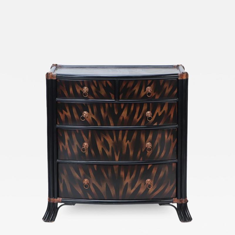 Maitland Smith A Maitland Smith ebonized five drawer bow front commode with flame decoration 