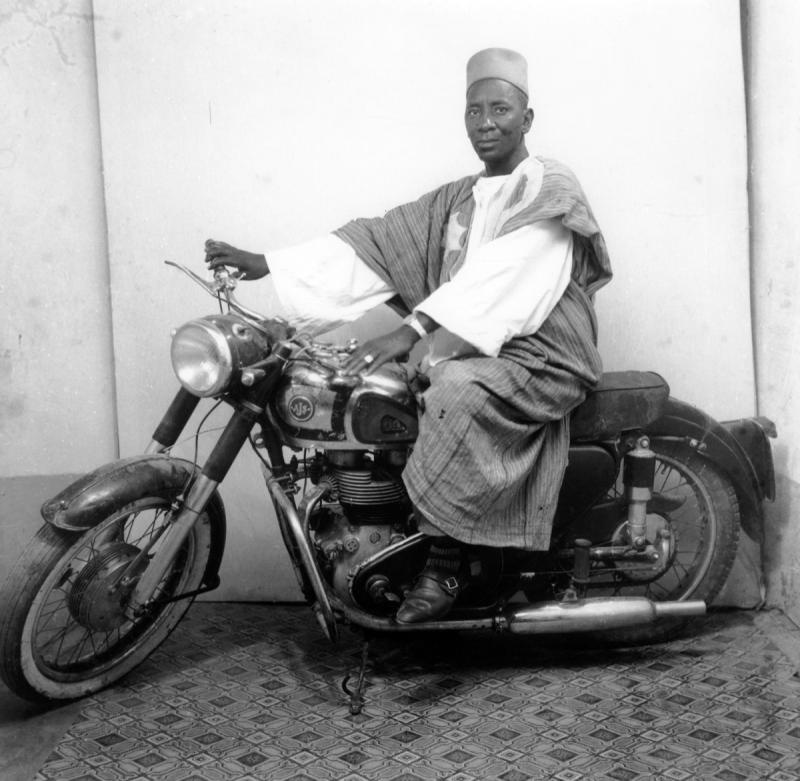 Malick Sidib Man on Motorcycle