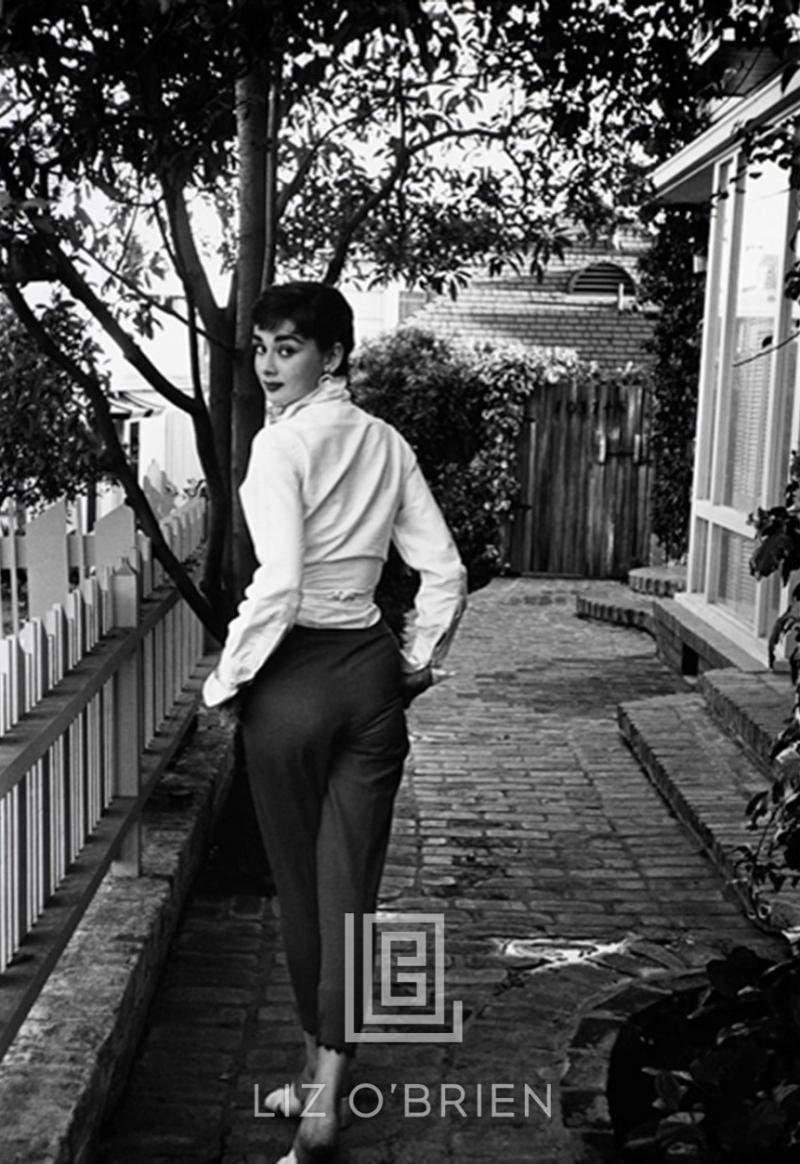 Mark Shaw Audrey Hepburn Walking Away and Looking Back 1953