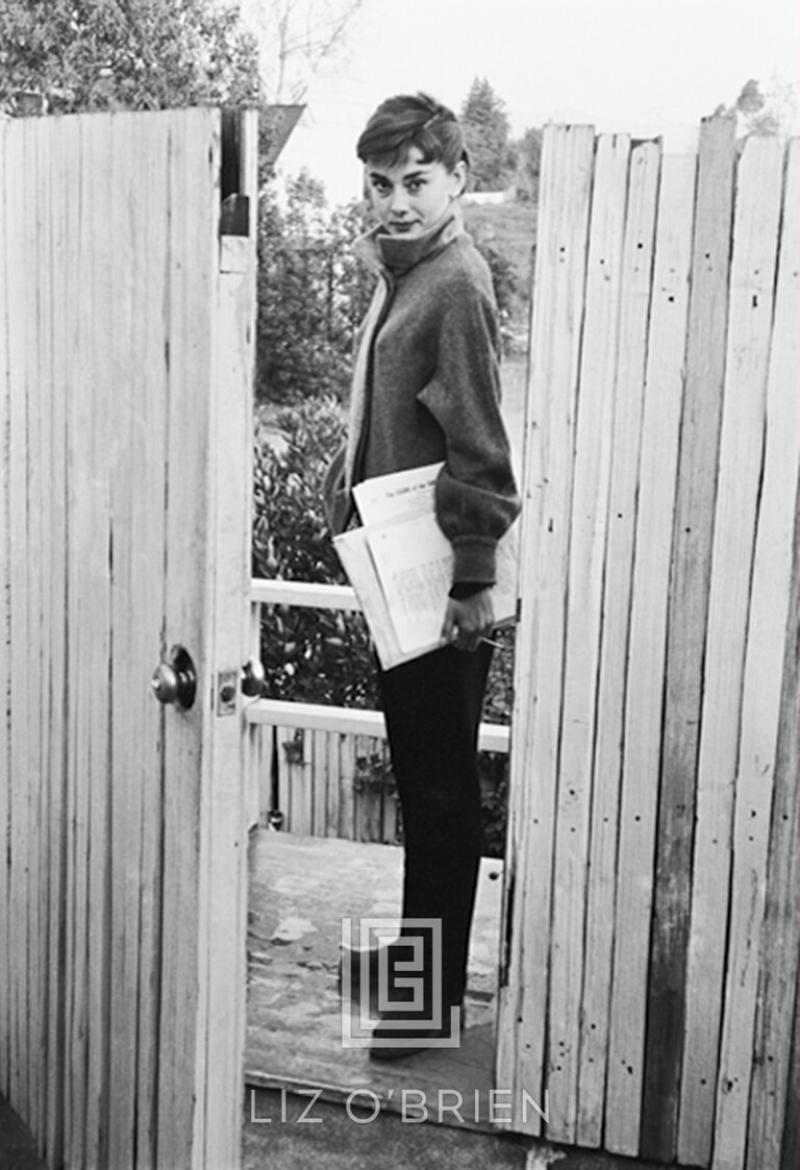 Mark Shaw Audrey Hepburn at Apartment Gate 1953