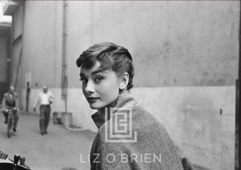 Mark Shaw Audrey Hepburn in Grey Turtleneck Sweater Glances Back 1953