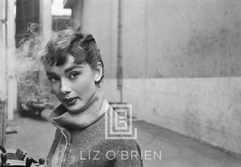 Mark Shaw Audrey Hepburn in Grey Turtleneck Sweater Glances Left with Smoke 1953