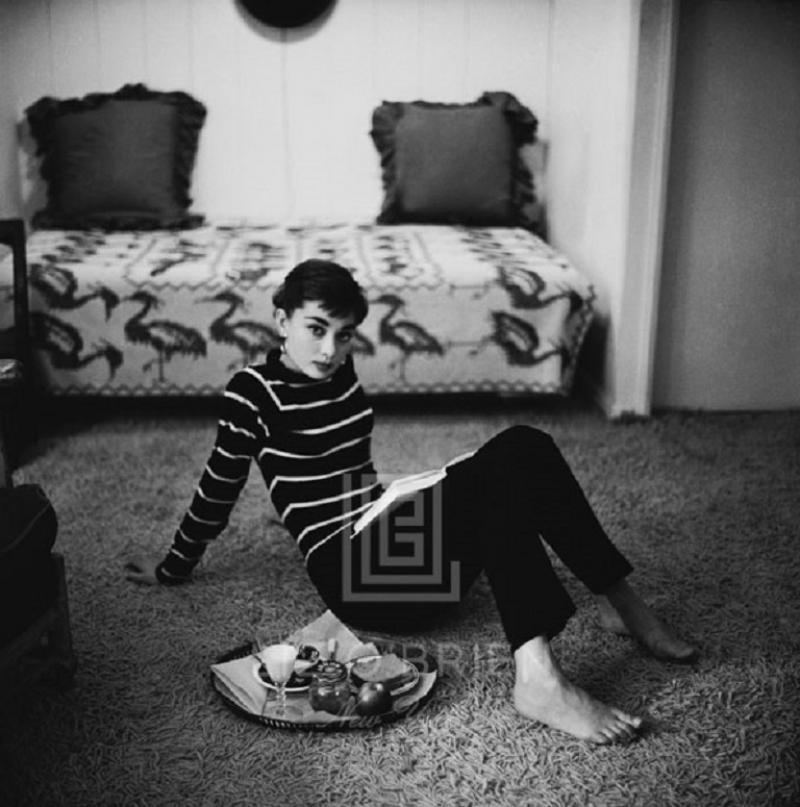 Mark Shaw Audrey Hepburn in Striped Sweater Lounges Arms Back 1953