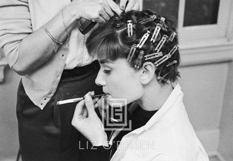 Mark Shaw Audrey Hepburn with Curlers Smoking 1953